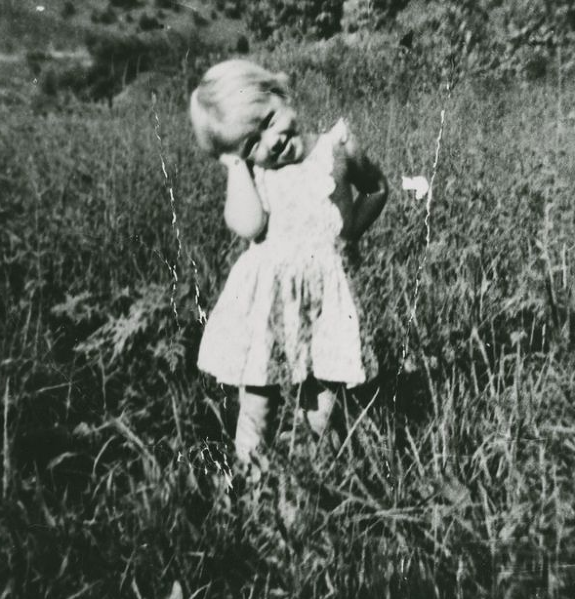 A 3-year-old Dolly Parton growing up in the foothills of the Great Smoky Mountains. Image Credit: Chasing Rainbows, Tennessee State Museum. A 3-year-old Dolly Parton growing up in the foothills of the Great Smoky Mountains. Image Credit: Chasing Rainbows, Tennessee State Museum.