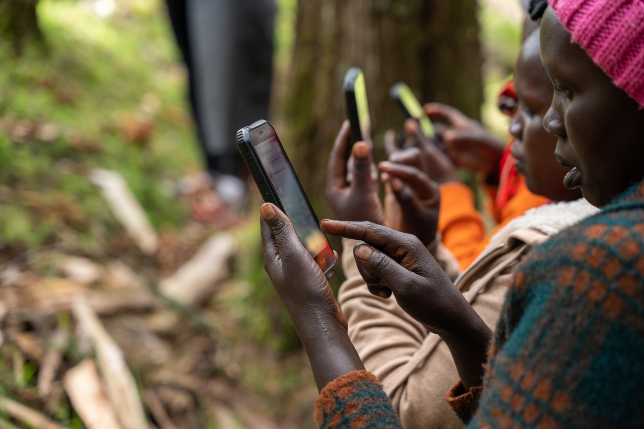 Ogiek women mapping out land using Mapeo. Image credit: Courtesy of Digital Democracy Ogiek women mapping out land using Mapeo. Image credit: Courtesy of Digital Democracy